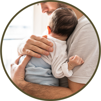 A proud dad holding his newborn